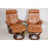 A pair of leather upholstered stressless tilt recliner chairs with matching stools