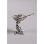 A 925 silver salt and spoon in the form of a clam shell held aloft by a fish, 1½"