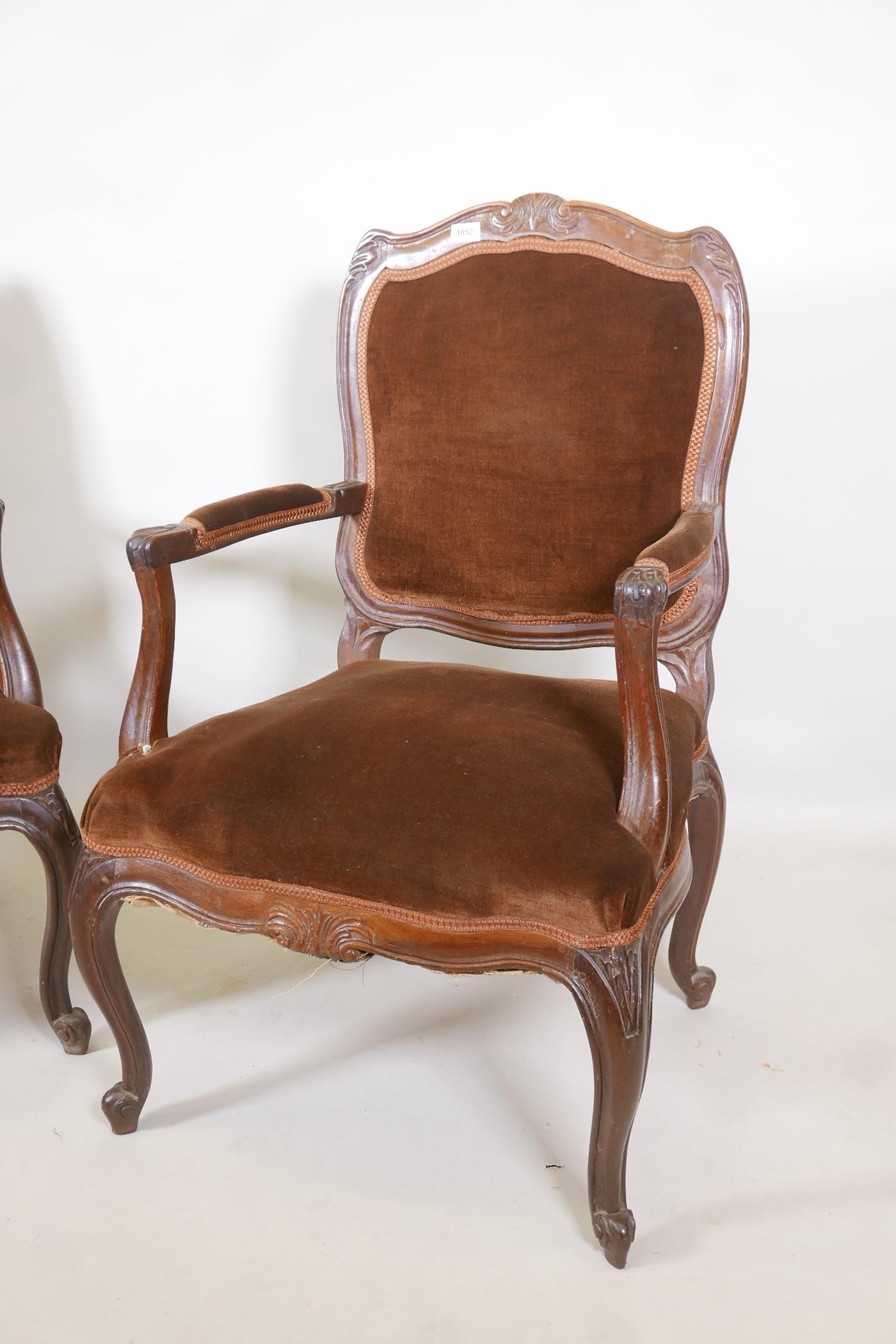 A pair of Continental walnut open armchairs on scroll feet with carved details, 38" high - Image 2 of 4
