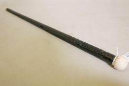An Anglo Indian carved ebony swagger stick with ivory mounts, inscribed NSS Sobraon, 25½" long