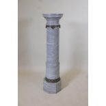 A three section marble pillar with bronze collar, the crown on turned stepped column and octagonal