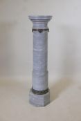 A three section marble pillar with bronze collar, the crown on turned stepped column and octagonal