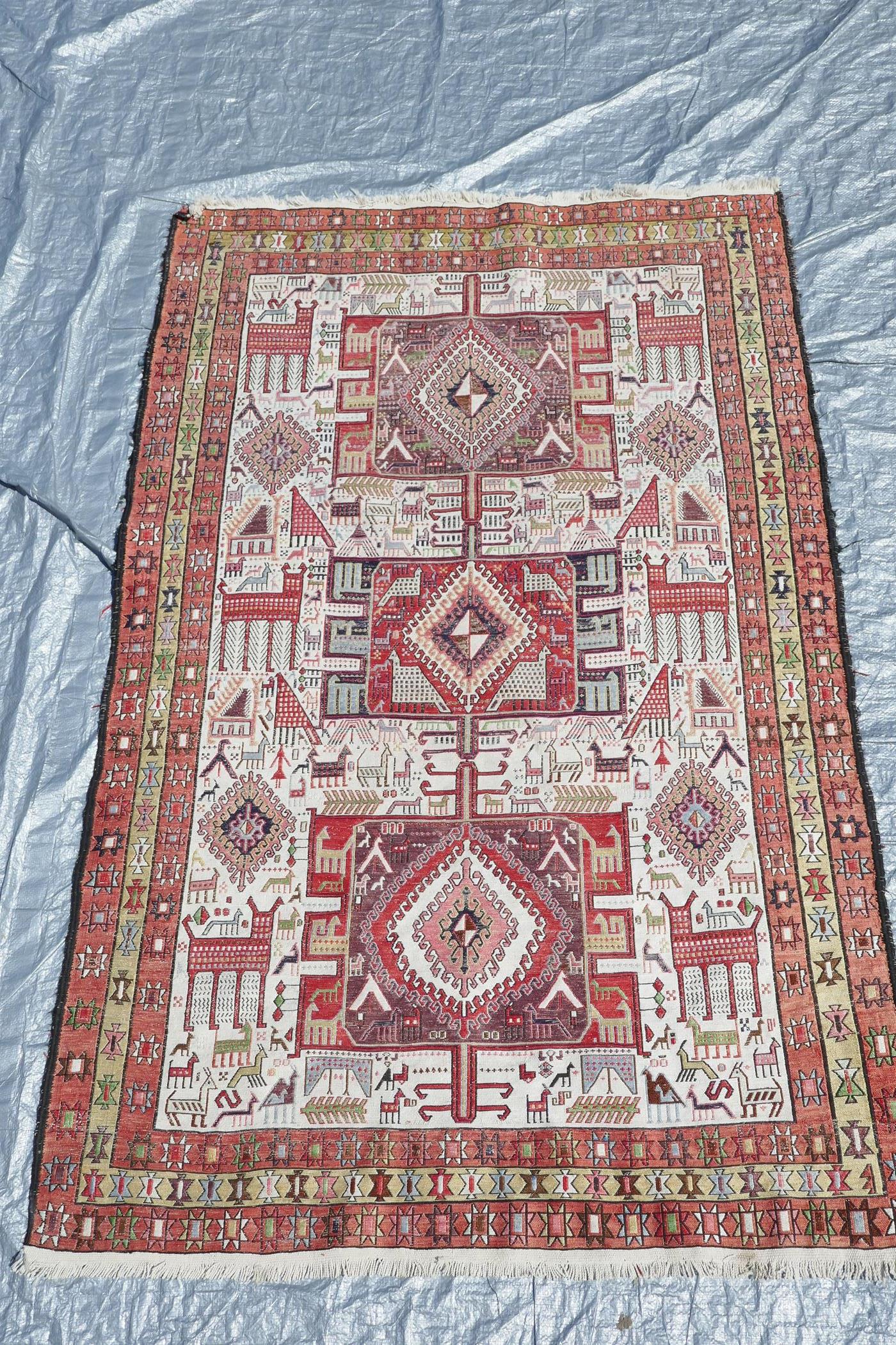 A Persian multicolour ground silk and wool rug decorated with three medallions and geometric - Image 2 of 7