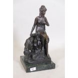 A bronze figure of a nude woman with a goat, after Jaques Limousin, mounted on a marble base, 17"
