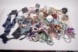 A quantity of costume jewellery, bangles, beads and necklaces