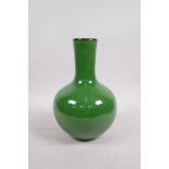 An apple green crackle glazed vase, 9" high