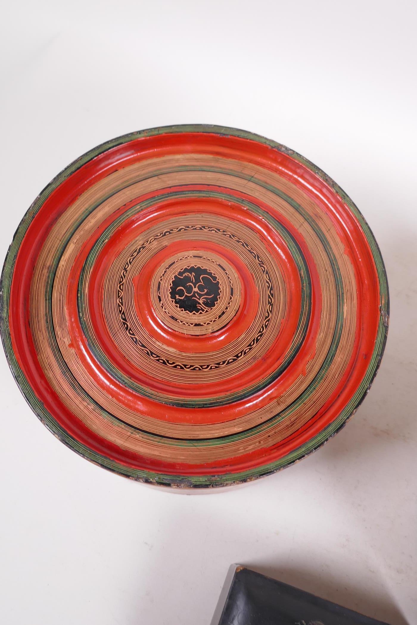 A Burmese turned and painted circular box and cover, 10½" diameter, together with an Indian circular - Image 3 of 4