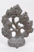 An ornate Chinese bronze money tree, 9" high