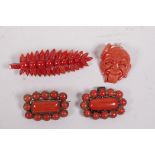 A small collection of antique coral brooches and pendants, largest 2½"