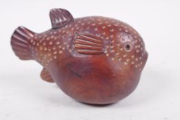A signed carved wooden snuff bottle carved as a blowfish, 3½" long