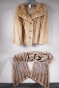 A lady's blonde fur short jacket, approximate size 14, 21" long, together with a silver fur stole,
