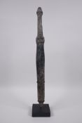 A Chinese archaic style bronze dagger/short sword, on a display mount, 15½" long without mount