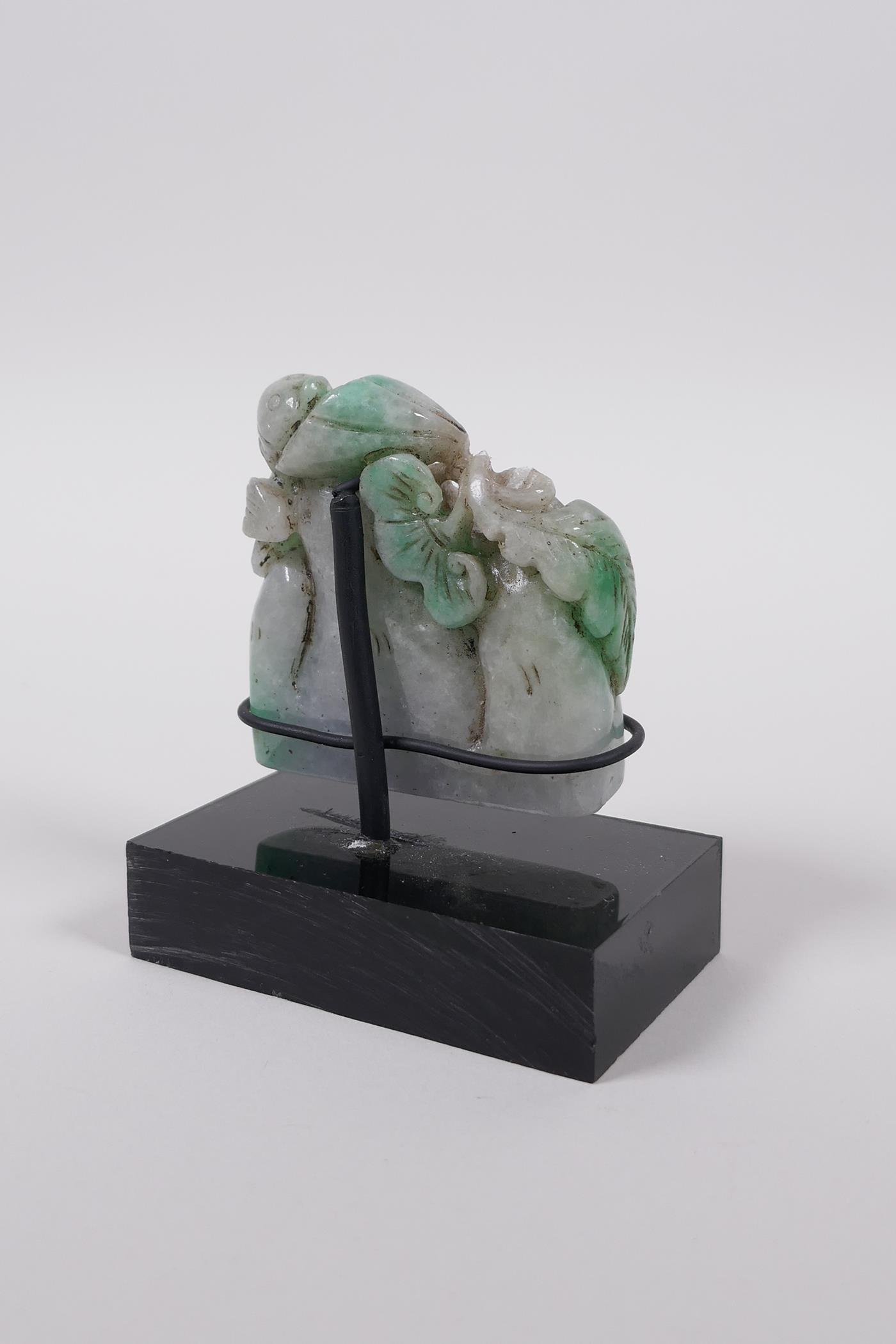 A Chinese mottled green jade carved ornament decorated with goldfish and lotus flowers on a - Image 3 of 4