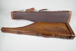 An antique leather 'Leg of Mutton' shotgun case, 31" long, together with a vintage shotgun case