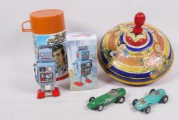 A quantity of vintage toys including a small tin plate robot, a Chad Valley humming top, two Corgi