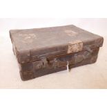 A good vintage leather suitcase with brass fittings by John Pound & Co