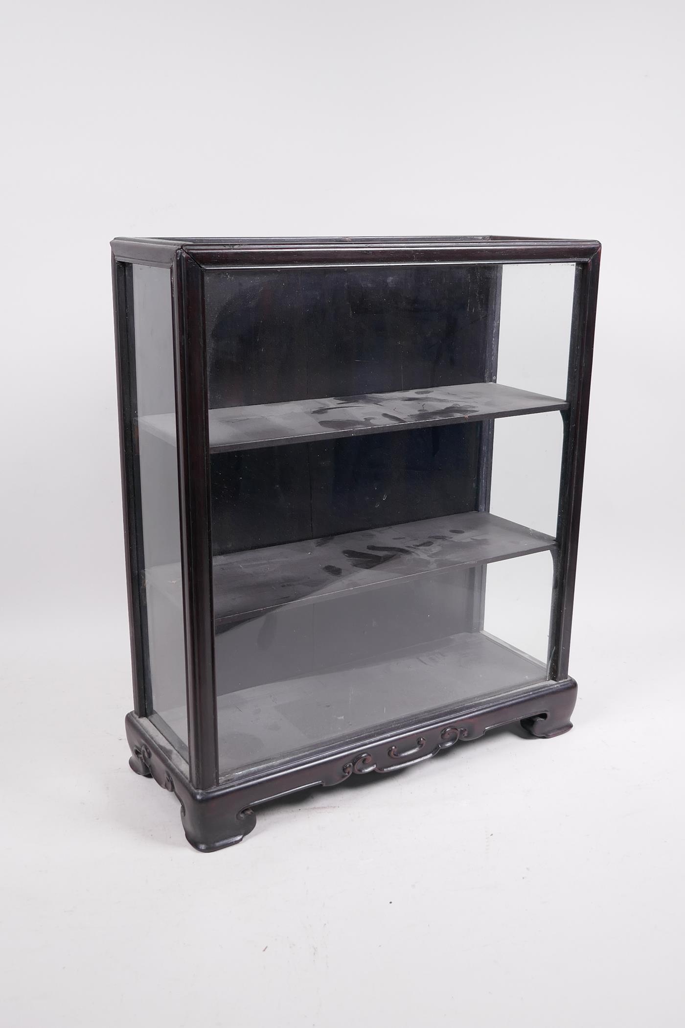 An antique Chinese hardwood and glass miniature display cabinet, 12½" x 5", 15" high