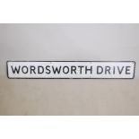 A painted metal road sign, 'Wordsworth Drive', 62" x 9"