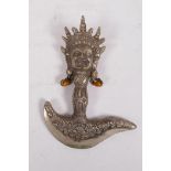 A Sino-Tibetan bronzed metal kartika, the handle decorated with a wrathful deity