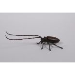 A Japanese Jizai style bronzed metal beetle with articulated limbs, antennae and carapace, 5½" long