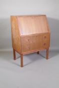 A Danish mid C20th teak fall front bureau by Gunnar Nielson Tibergaard for Ikast Meobelfabrik, 28" x