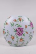 An Oriental famille rose porcelain moon vase with floral decoration, 11½" high