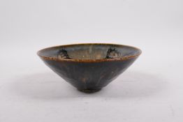 A Cizhou kiln conical bowl with butterfly decoration, Chinese origin, 6½" diameter