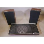 A Bang & Olufsen Beo-Centre 2002 with two Beovox S.30 speakers in rosewood cases
