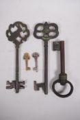 An assorted collection of five metal keys, largest 11½"