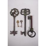 An assorted collection of five metal keys, largest 11½"