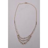 A 9ct yellow gold and pearl necklace, 16½" long