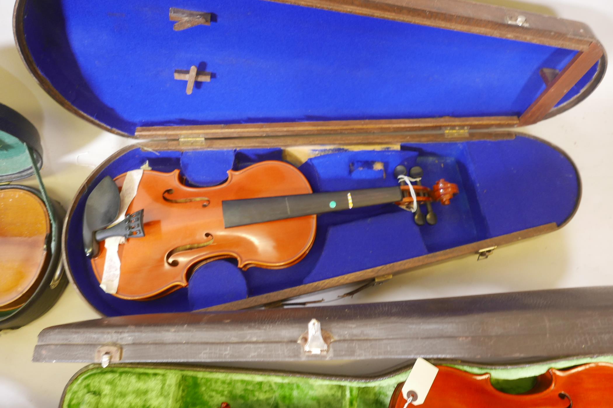 Eight violins for restoration, various states of disrepair, and including several good carry cases - Image 6 of 9