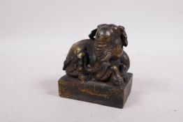 A gilt metal seal in the form of an elephant with ruyi, 4" high