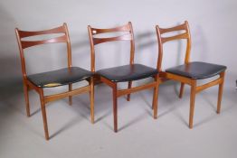 A set of three mid C20th Danish teak dining chairs, A/F repairs