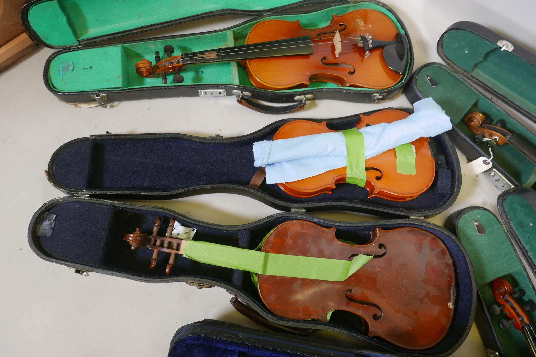 Eight violins for restoration, various states of disrepair, and including several good carry cases - Image 2 of 9