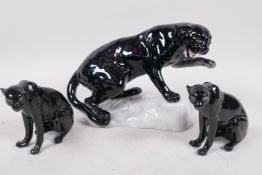 A rare Beswick figurine 'The Black Panther' no.1823, together with two Royal Worcester figurines