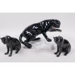 A rare Beswick figurine 'The Black Panther' no.1823, together with two Royal Worcester figurines