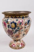 A C19th Zsolnay porcelain oil lamp base painted with flowers, 8" high