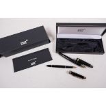 A Mont Blanc presentation set with fountain pen and ballpoint (pencil missing), with service guide