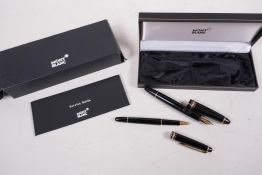 A Mont Blanc presentation set with fountain pen and ballpoint (pencil missing), with service guide