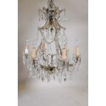 A six branch glass chandelier with lustre drops, 30" drop