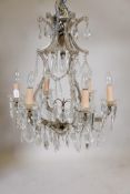 A six branch glass chandelier with lustre drops, 30" drop