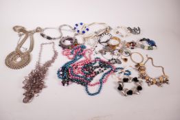 A quantity of costume jewellery, bead necklaces, bangles etc