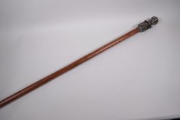A hardwood walking stick with brass handle containing a compass and small telescope, 38" long