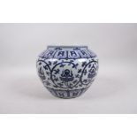 A Ming style blue and white porcelain jar decorated with lotus flowers and the eight Buddhist
