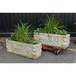 A pair of reconstituted stone garden planters, 28" x 9" x 10½"