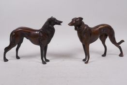 A pair of bronze figures of hounds, 6½" high