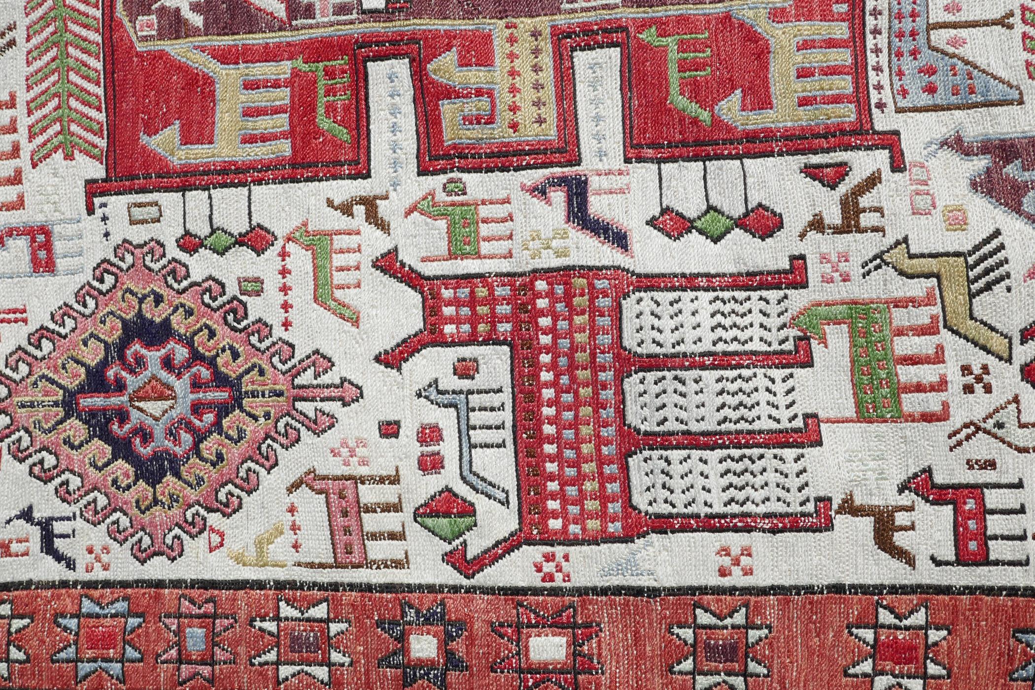 A Persian multicolour ground silk and wool rug decorated with three medallions and geometric - Image 4 of 7