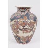 An Oriental porcelain vase, with cloisonne style decoration of birds and flowers, seal mark to base,