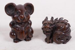 Two carved wooden netsuke, a mouse 2" high, and a coiled dragon, both signed with seal marks